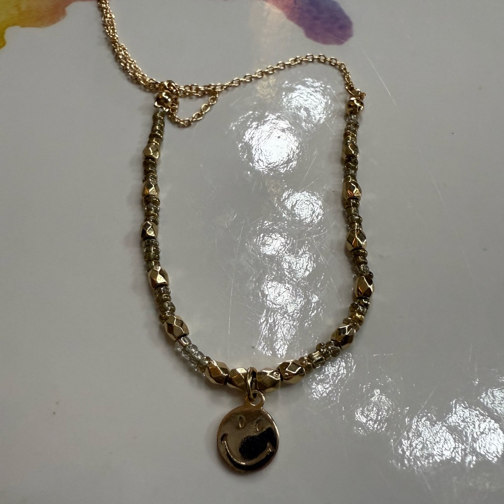 Gold Beaded Necklace with Smiley Pendant